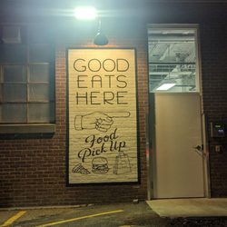 Mike and Lenny's Bar Pizza - The man carrying the food exits this door and delivers it to your car