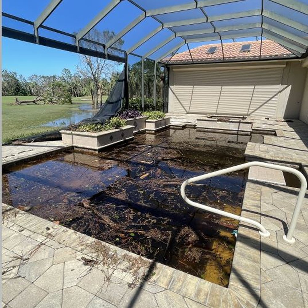 Azure Pool And Deck Design - Pool Hurricane Damage - Decks & Railing Near Me - Estero, Florida Azure Pool And Deck Design - Pool Hurricane Damage - Decks & Railing Near Me - Estero, Florida