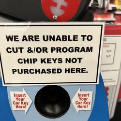 Pedrotti Ace Hardware - Sign by the key cutting machine