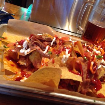 Twin Peaks - Pulled Pork Nachos are a shareable app or meal. - Sports Bars Near Me - Orlando, Florida