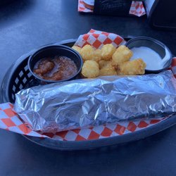 Frank’s - Super tasty breakfast burrito with tater tots
