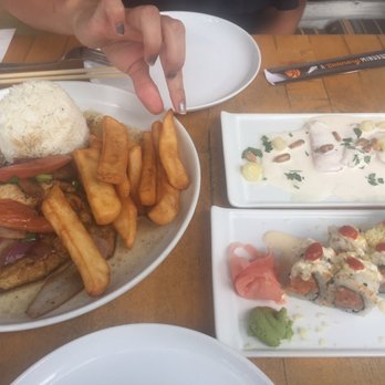 SuViche - Sushi and Ceviche - Tiradito - spicy tuna roll - chicken saltado and a sneaky hand attacking the fries! - Peruvian Near Me - Miami, Florida SuViche - Sushi and Ceviche - Tiradito - spicy tuna roll - chicken saltado and a sneaky hand attacking the fries! - Peruvian Near Me - Miami, Florida