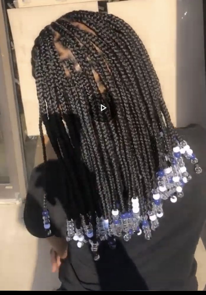 Kamer Braids Salon Logo