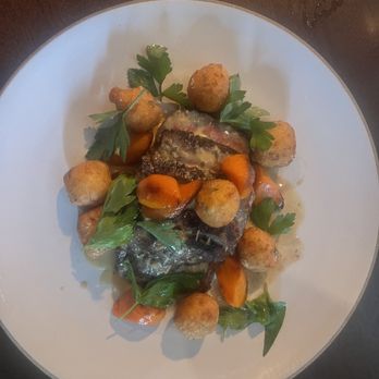 Lowland Tavern - New York strip with gnocchi and roasted carrots - New American Near Me - Charleston, South Carolina Lowland Tavern - New York strip with gnocchi and roasted carrots - New American Near Me - Charleston, South Carolina