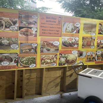 Al Son De Mi Barrio - a food stand with menus - Mexican Near Me - Providence, Rhode Island Al Son De Mi Barrio - a food stand with menus - Mexican Near Me - Providence, Rhode Island