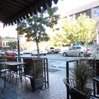 Tony's Pizzeria Teatro - seating for roughly 10 at tables and chairs on outside sidewalk - Italian Near Me - Boise, Idaho Tony's Pizzeria Teatro - seating for roughly 10 at tables and chairs on outside sidewalk - Italian Near Me - Boise, Idaho