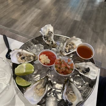 Pirates Kitchen - Half dozen oysters with tapatio - Cajun/Creole Near Me - Artesia, California Pirates Kitchen - Half dozen oysters with tapatio - Cajun/Creole Near Me - Artesia, California