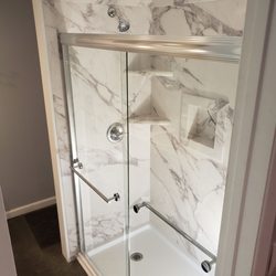 San Diego Bath Wraps - Carrera white enclosure with Delta Chrome fixtures.