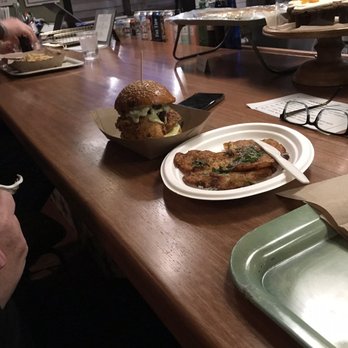 Barrow Food House - Bar area- chicken sandwich and summer squash latkes - New American Near Me - Riverhead, New York