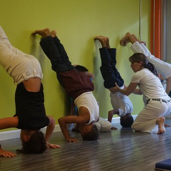 Project Commotion - Students work on their head stands in Capoeira class. - Martial Arts Near Me - San Francisco, California Project Commotion - Students work on their head stands in Capoeira class. - Martial Arts Near Me - San Francisco, California