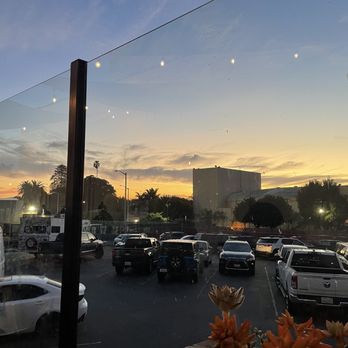 Fluid State Beer Garden - a view of a parking lot - Bars Near Me - Ventura, California Fluid State Beer Garden - a view of a parking lot - Bars Near Me - Ventura, California