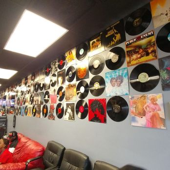 Playaz Barber Shop - Old album filled walls - Barbers Near Me - Lawrenceville, Georgia Playaz Barber Shop - Old album filled walls - Barbers Near Me - Lawrenceville, Georgia