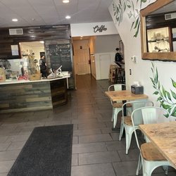 Crate & Press Juice Bar - Main bar with rear bathroom