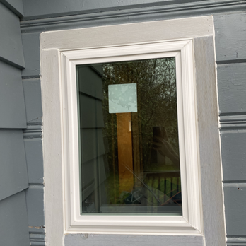 Marksman Exteriors - Laundry room picture window exterior - Windows Installation Near Me