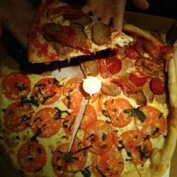 Half Meat Lovers, Half Tomato, Basil, Garlic and Mozarella. SO good!!!