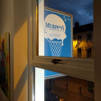 Murphy's Ice Cream - The birds on the sign are no joke.  We watched a scary murder of crows flocking and flying outside this window! - Ice Cream & Frozen Yogurt Near Me - Killarney, Kentucky