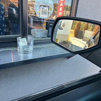 Starbucks - the reflection of a glass of water in the rear view mirror of a car - Coffee & Tea Near Me - Villa Rica, Georgia