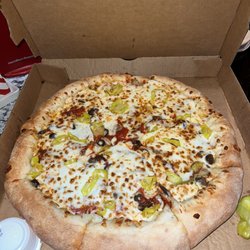 Papa Johns Pizza - Epic stuffed crust with Pepperoni, Mushrooms, banana peppers, and black olives  Really good Pizza