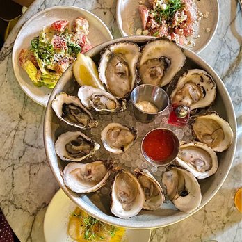 Seaworthy - Oyster Flight Watermen Salad Little Gem Salad @phidingthefam - Cocktail Bars Near Me - New Orleans, Louisiana Seaworthy - Oyster Flight Watermen Salad Little Gem Salad @phidingthefam - Cocktail Bars Near Me - New Orleans, Louisiana