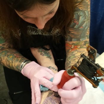 Rabid Hands Tattoo Studio - Sara purr tattoing my mommie dearest owl at the 2014 seattle tattoo expo - Tattoo Near Me - Seattle, Washington