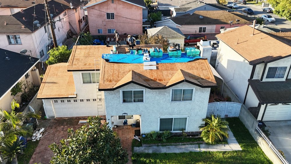 Slide of Meza Roofing Systems