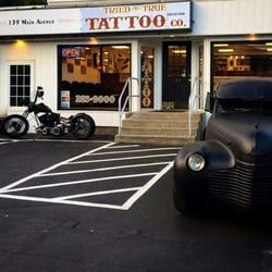 Tried & True Tattoo - Front door (with a nice view) from the street corner edge of the parking lot