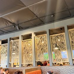 Inside screens to separate bar from dining area