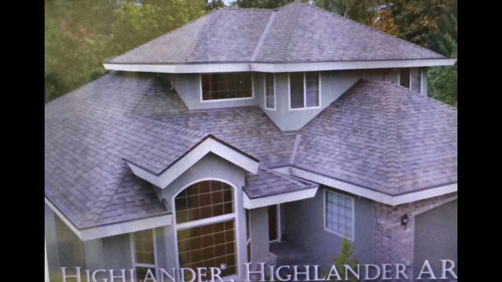 Slide of Denison Roofing