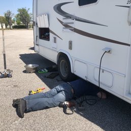 Changing our own tires in their lot.