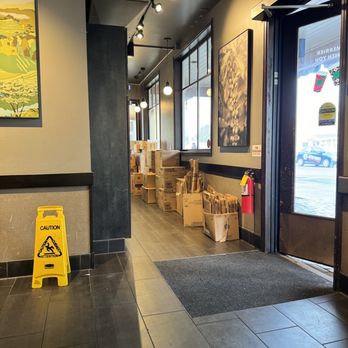 Starbucks - Tons of boxes lining the wall. It makes it look even more dirty than it is. - Coffee & Tea Near Me - Eureka, California
