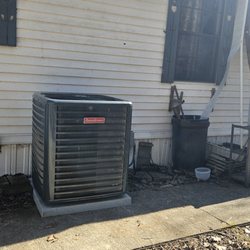 Mainline Plumbing - New unit after a tree fell on the building.