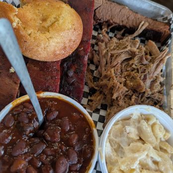 Up in Smoke BBQ - Three meat platter with two sides showing the baked beans and mac and cheese with pulled pork and St. Louis style ribs - Barbeque Near Me - St Cloud, Minnesota Up in Smoke BBQ - Three meat platter with two sides showing the baked beans and mac and cheese with pulled pork and St. Louis style ribs - Barbeque Near Me - St Cloud, Minnesota