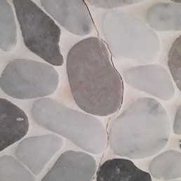 a close up of a stone floor a close up of a stone floor