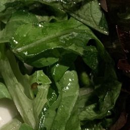 Slimy brown greens in salad