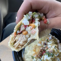 Carnitas Javi's Taco with Javi's way toppings and Tomatillo salsa