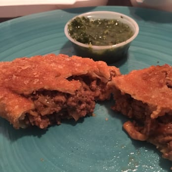 Johnny Pacific - Beef (with peas and potato inside) with chimmi churri sauce - Latin American Near Me - Winnetka, California Johnny Pacific - Beef (with peas and potato inside) with chimmi churri sauce - Latin American Near Me - Winnetka, California