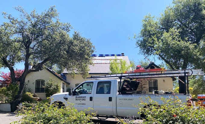 Slide of Harbert Roofing