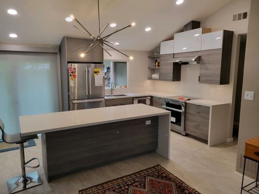 Kitchen Remodels - During the Fall and Winter, it is a good time to consider a kitchen and bath remodel if only to provide the window of time where your remodeling contractor will have the time to dedicate and finish the remodeling job in a timely manner rather than compete with the remodeling contractor's client base during the summer months.

Adam Welsh, owner of Creative Construction Co. in Napa offers free estimates on-site. He also is very considerate of your time and money. Many times, when his clients are considering a kitchen or a bathroom remodel, what they really want and need is a "polish". Maybe replace a few things or fixtures, perhaps just refinish the cabinet doors, etc.

Kitchen and Bathroom "polishing" (repKitchen Cabinet refinishing including tile installation, countertops, granite, Corion, laminates, cultured marble.
Bathroom remodels and polishing
General interior construction projects