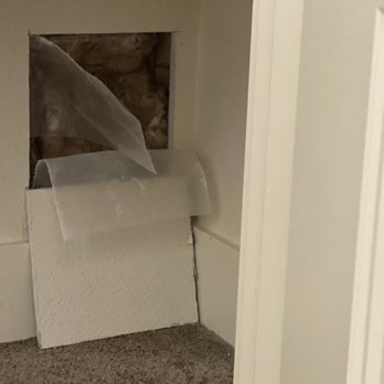 Summit Plumbing - a hole in the wall of a bathroom - Plumbing Near Me - Camas, Washington