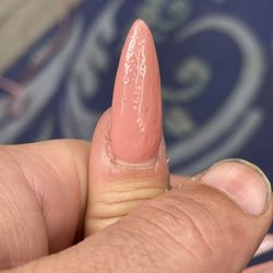 Paris Nails & Spa - How can you, in good faith,  let your client walk out with nails looking like this?