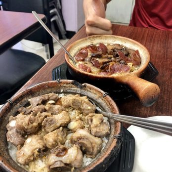 Clay Pot Cafe - Pork ribs (front) and Chinese sausage/ pork belly (back). We asked for no scallions - Cantonese Near Me - Boston, Massachusetts