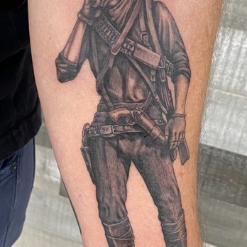 Innerlight Tattoo - Gunslinger considering a kill - Tattoo Near Me - Torrance, California Innerlight Tattoo - Gunslinger considering a kill - Tattoo Near Me - Torrance, California