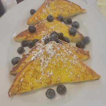 Fulton Diner - a plate of french toast with blueberries and powdered sugar - Diners Near Me - Hempstead, New York Fulton Diner - a plate of french toast with blueberries and powdered sugar - Diners Near Me - Hempstead, New York