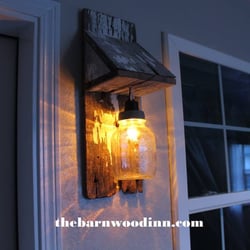The BarnwooD Inn - Just one of the BarnwooD sconces that decorate the 8 room hallway.