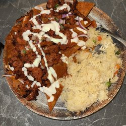 Los Cabos Seafood & Grill - Chilaquiles with rice and Al pastor