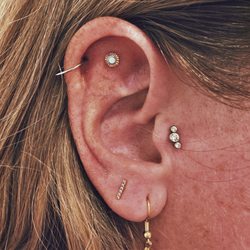 Iris Piercing Studios & Jewelry Gallery - Tragus and flat piercings