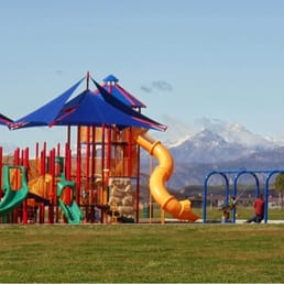 Very nice play area surrounded by large, grassy playing fields.