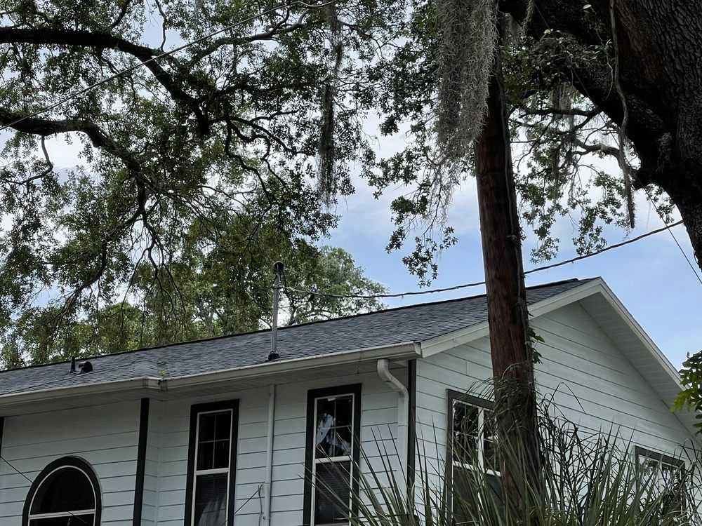 Slide of Janney Roofing