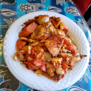 Badou Senegalese Cuisine - Thiebou djen jolof- fried tilapia with jolof rice and cabbage. Tomato and onion based. So good! - Senegalese Near Me - Chicago, Illinois Badou Senegalese Cuisine - Thiebou djen jolof- fried tilapia with jolof rice and cabbage. Tomato and onion based. So good! - Senegalese Near Me - Chicago, Illinois