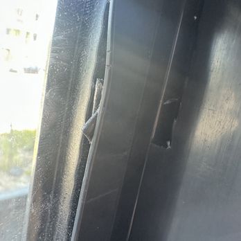 Durable Windows And Doors - Window sill bent; vinyl cut jagged to clear bow in sill. Foam falling apart - Windows Installation Near Me - Los Angeles, California